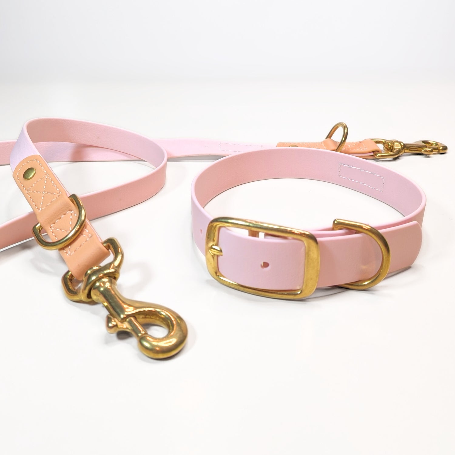 Premium Walk Set | Dog Harness, Leash & Collar - Soft pink collar and leash with gold metal hardware and light leather accents on white background