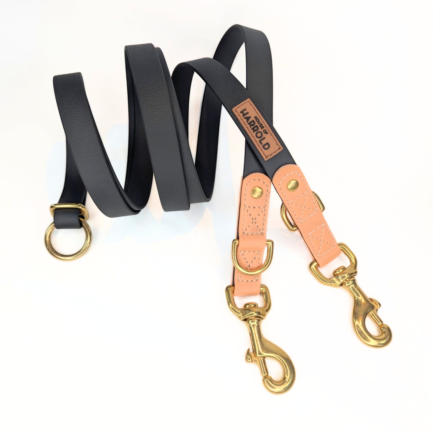 Black PVC 100% Vegan Dog Leash with Brass Hardware on a White Background
