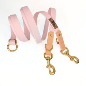 Pink PVC 100% Vegan Dog Leash with Brass Hardware on a White Background