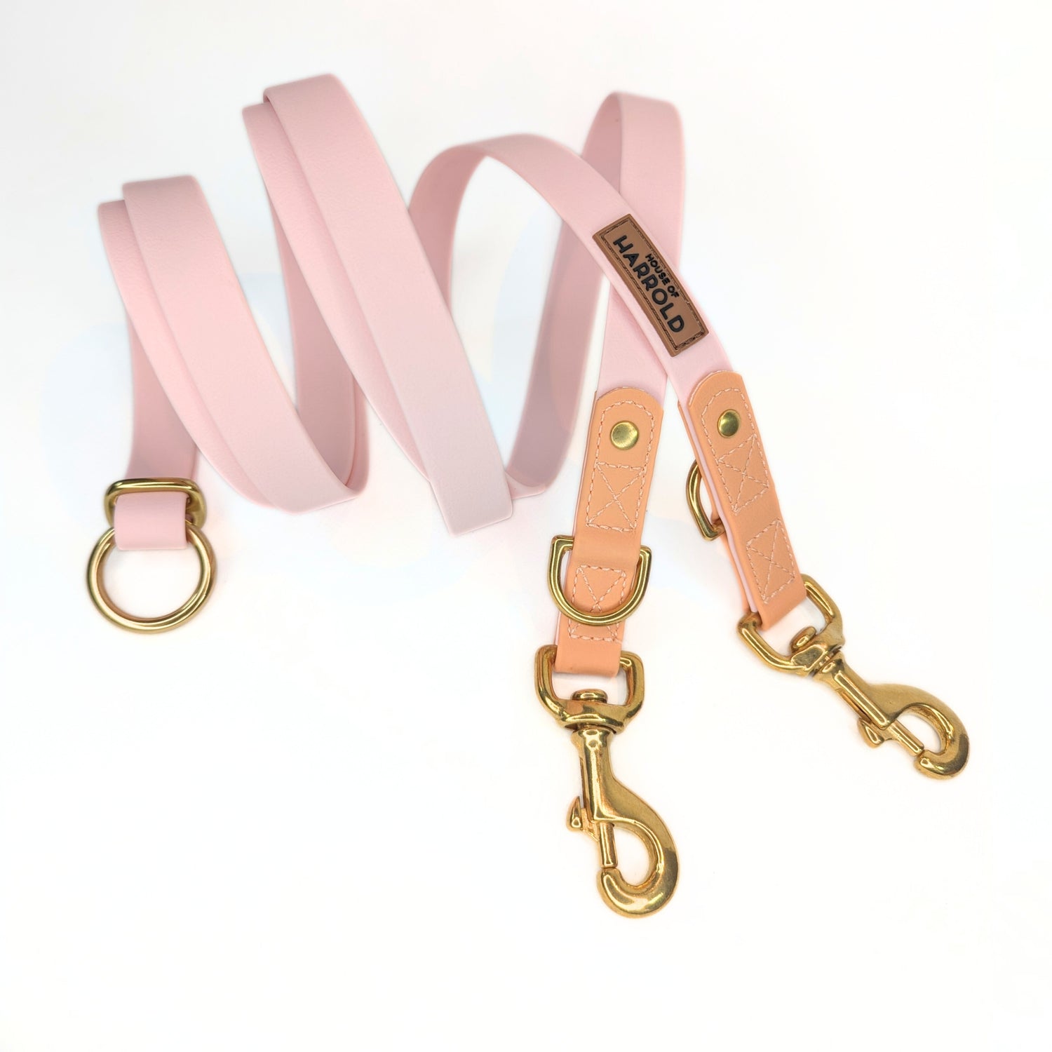 Pink PVC 100% Vegan Dog Leash with Brass Hardware on a White Background