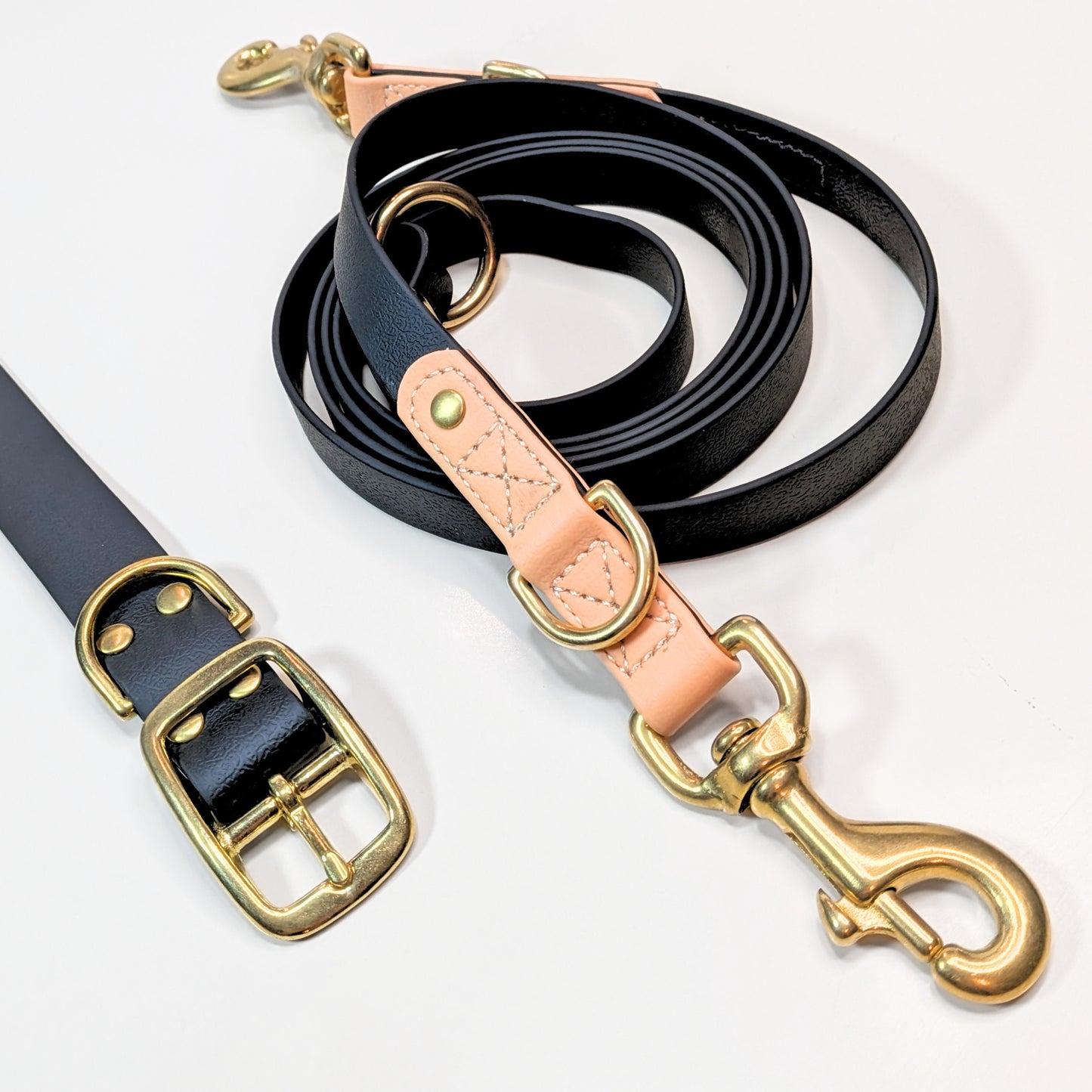 Premium Walk Set | Dog Harness, Leash & Collar - Black with gold hardware and tan leather accents on a white background