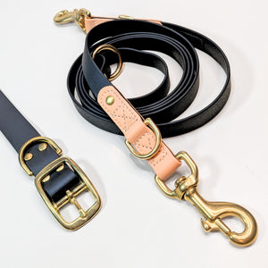 Premium Walk Set | Dog Harness, Leash & Collar - Black with gold hardware and tan leather accents on a white background